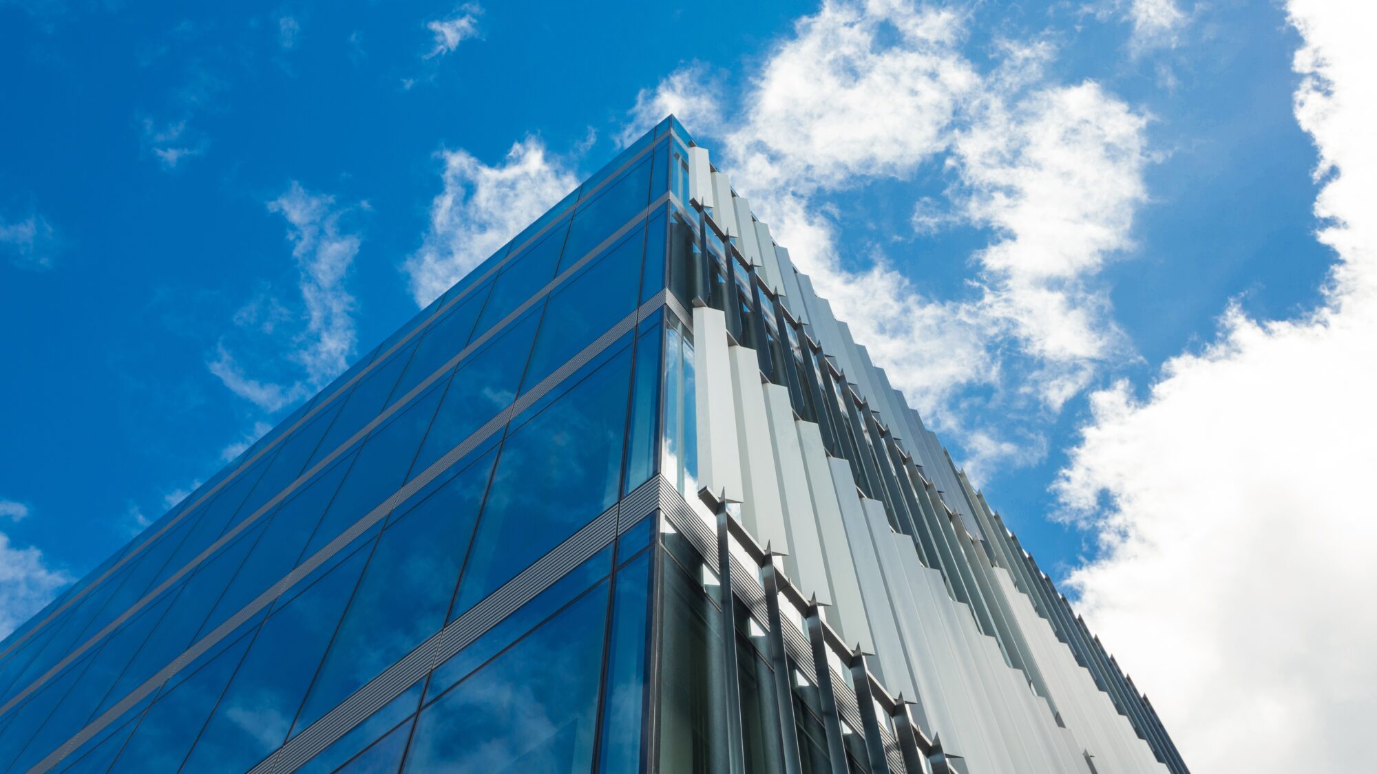 Low angle view of office building on a sunny day